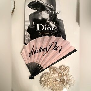 Christian Dior
Signature Logo Folding Fan -Pink/ Black with brand logo.